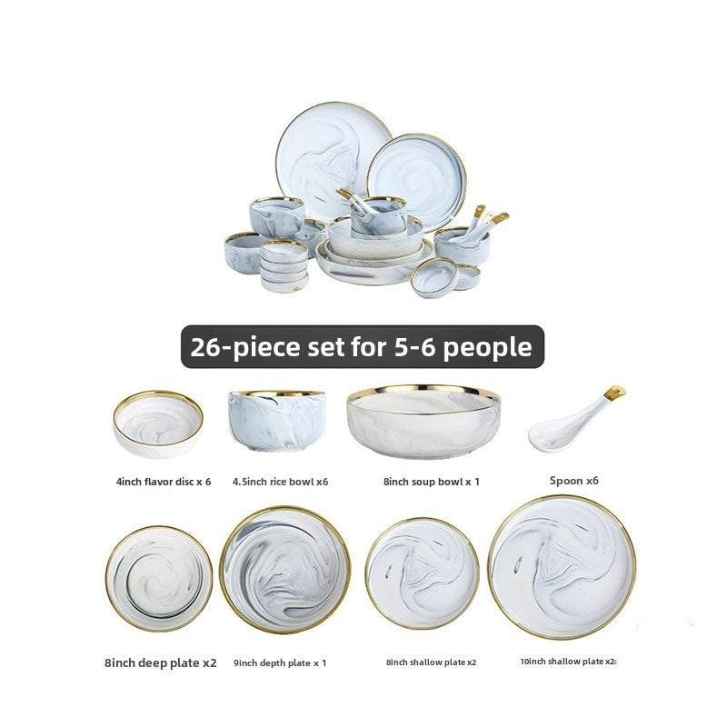 Gold-rimmed porcelain bowl and plate set