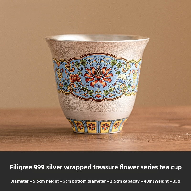 Filigree silver tea cup